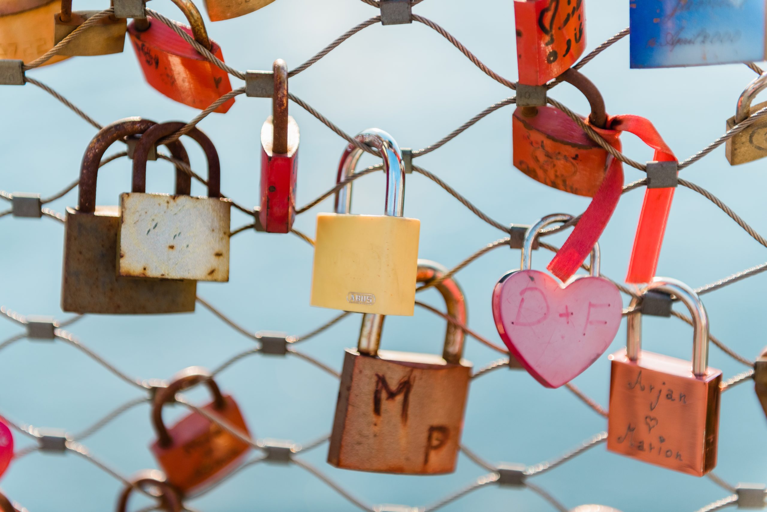 multiple-colourful-locks-on-a-fence-2022-11-04-00-46-12-utc